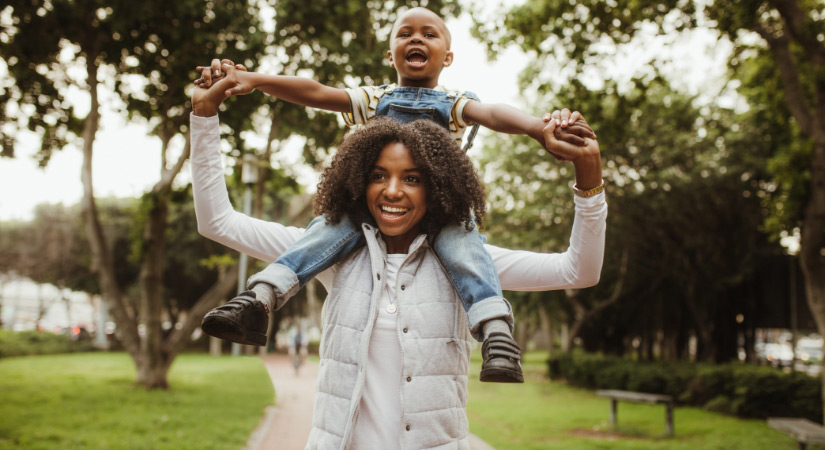 woman playing with a child