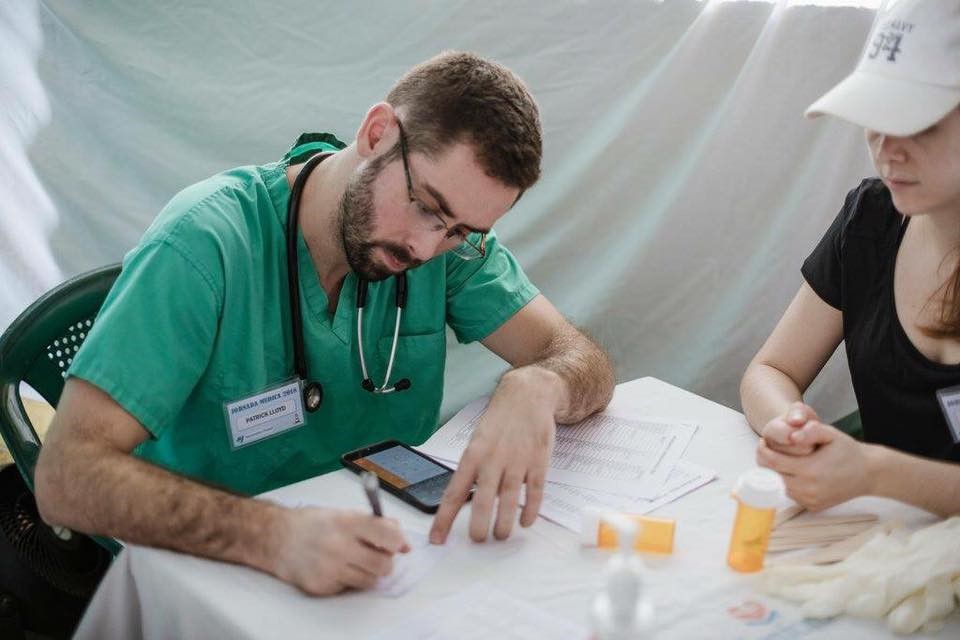 A doctor meets with a patient