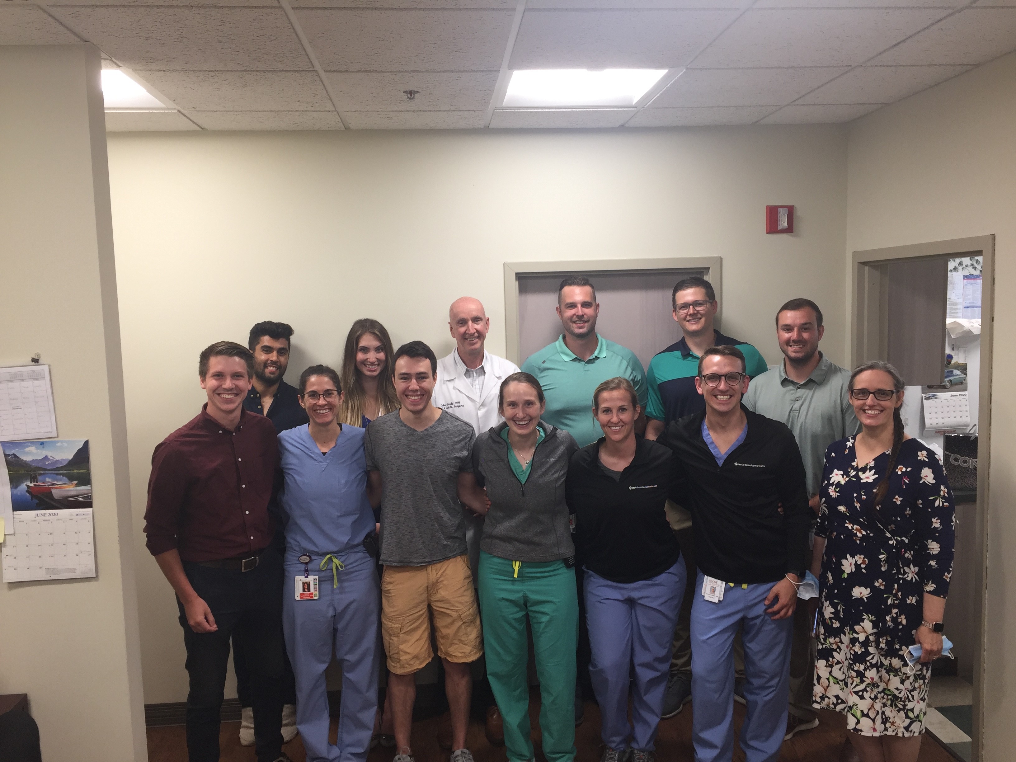 Group photo of nurses, doctors and staff