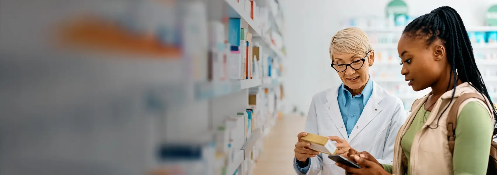 Health care worker going over medication with customer